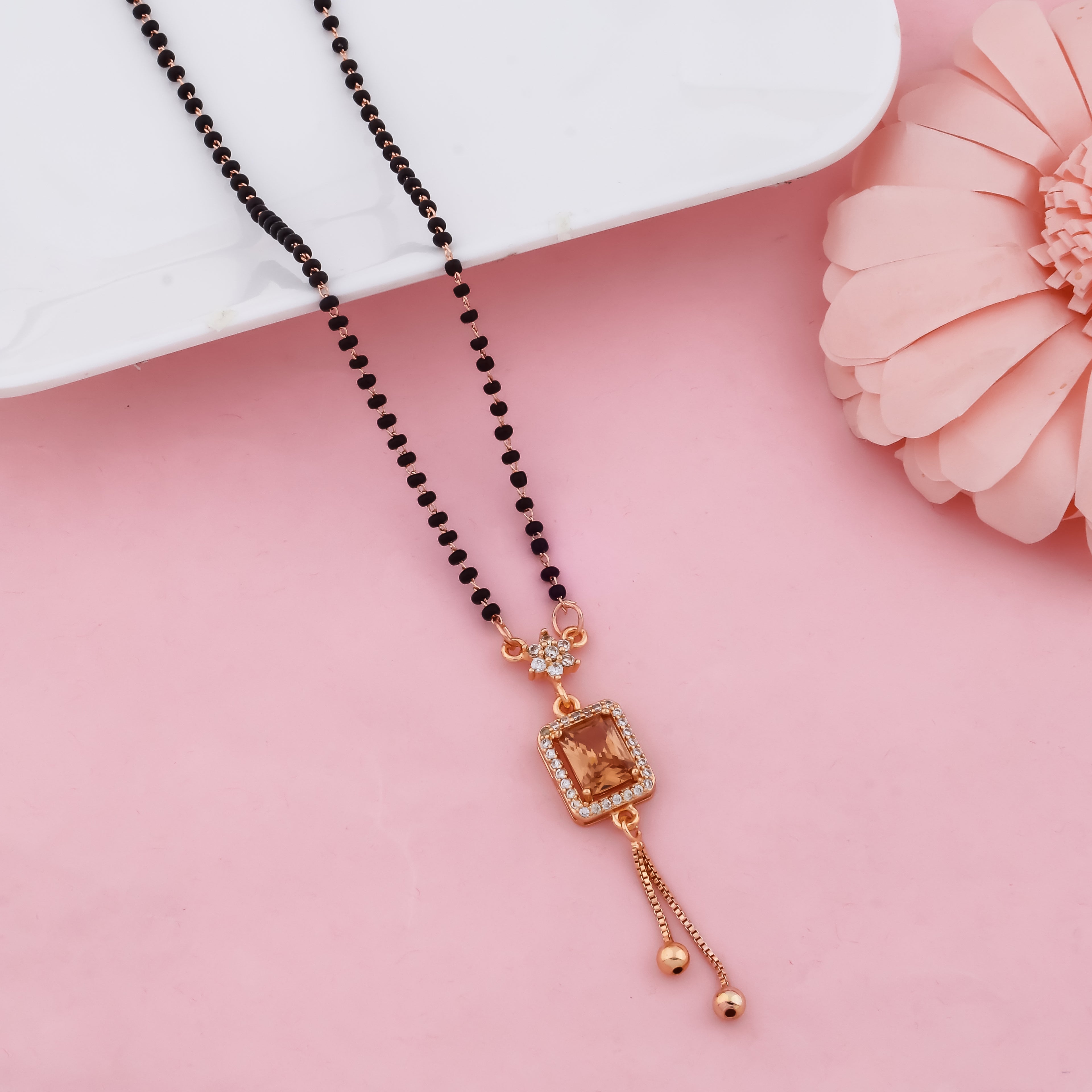 Elegant Black Beads Mangalsutra with Champagne Stone Pendant and Gold Finish Drop Design for Women | VJIPC1040